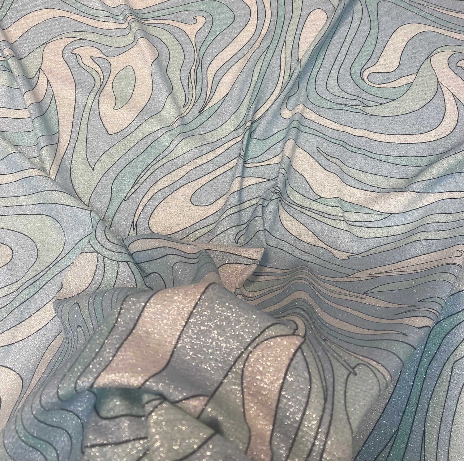 Abstract Baby Blue Swirl Lurex Fabric by the Metre