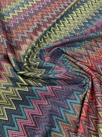Multicolor zigzag pattern woven fabric with gold lurex glitter and 4-way stretch spandex blend