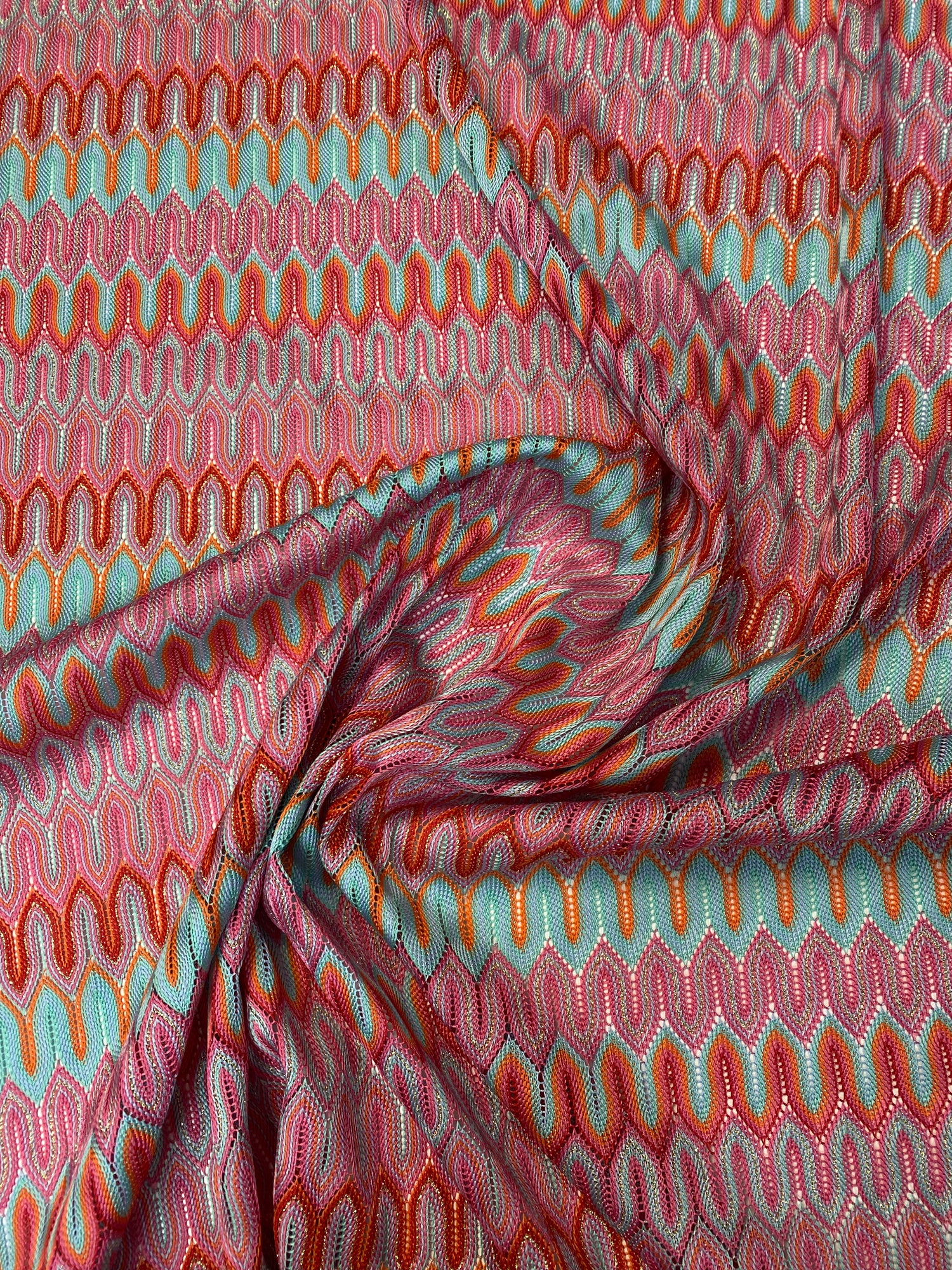 Coral Abstract Mesh Fabric by the Metre