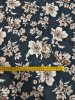 Vintage floral fabric with beige and white flowers on a dark background measuring 150cm wide