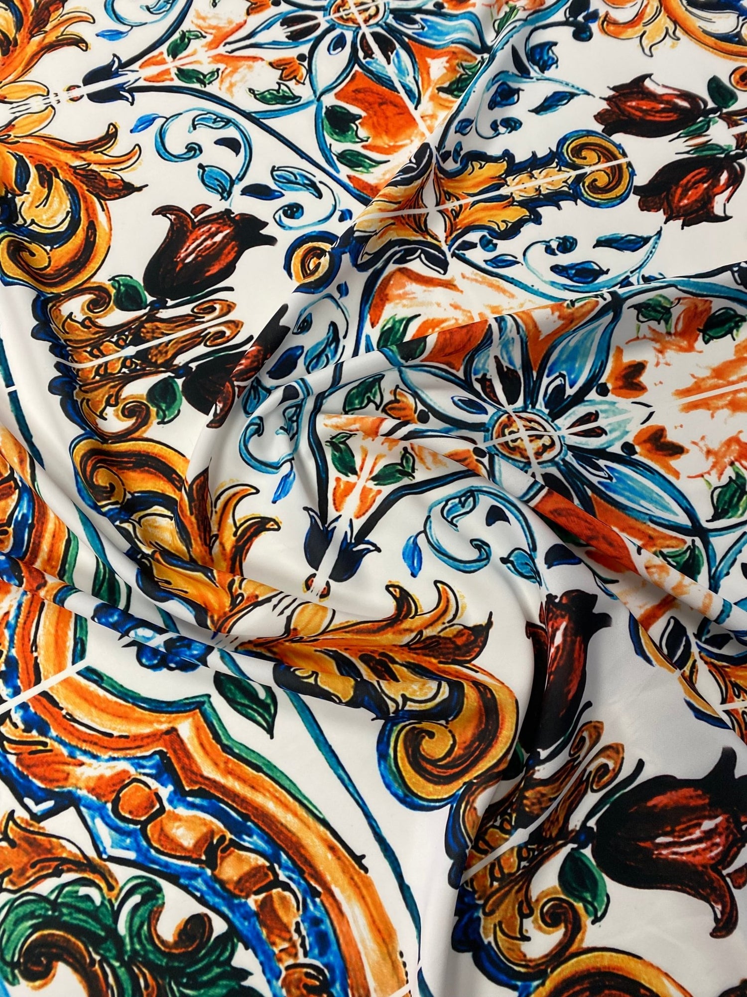 Mediterranean Tile Print Crepe Fabric by the Metre – Multicolour showcasing vibrant floral and geometric patterns.