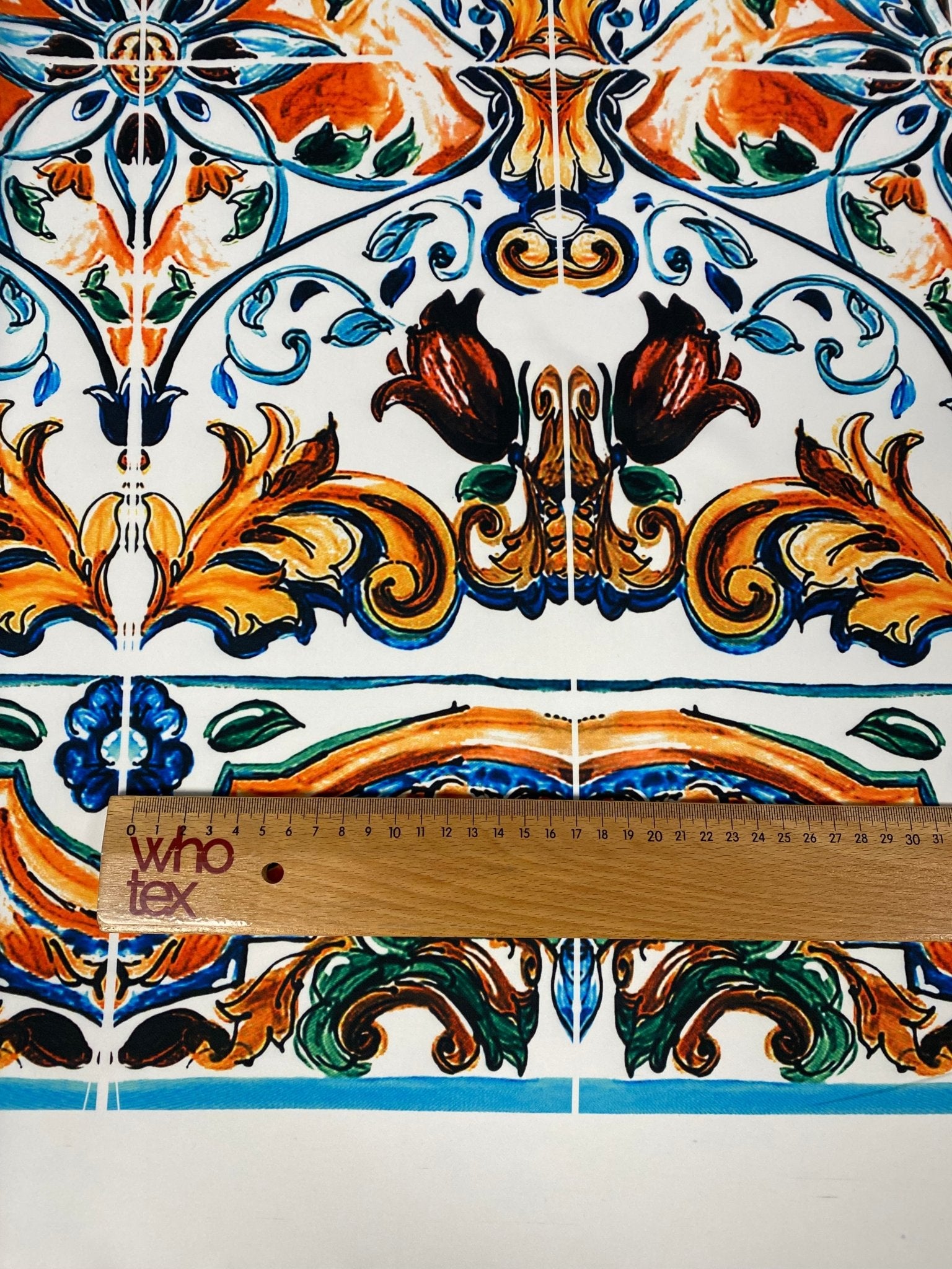Mediterranean Tile Print Crepe Fabric by the Metre – Multicolour displayed with a ruler for size reference.