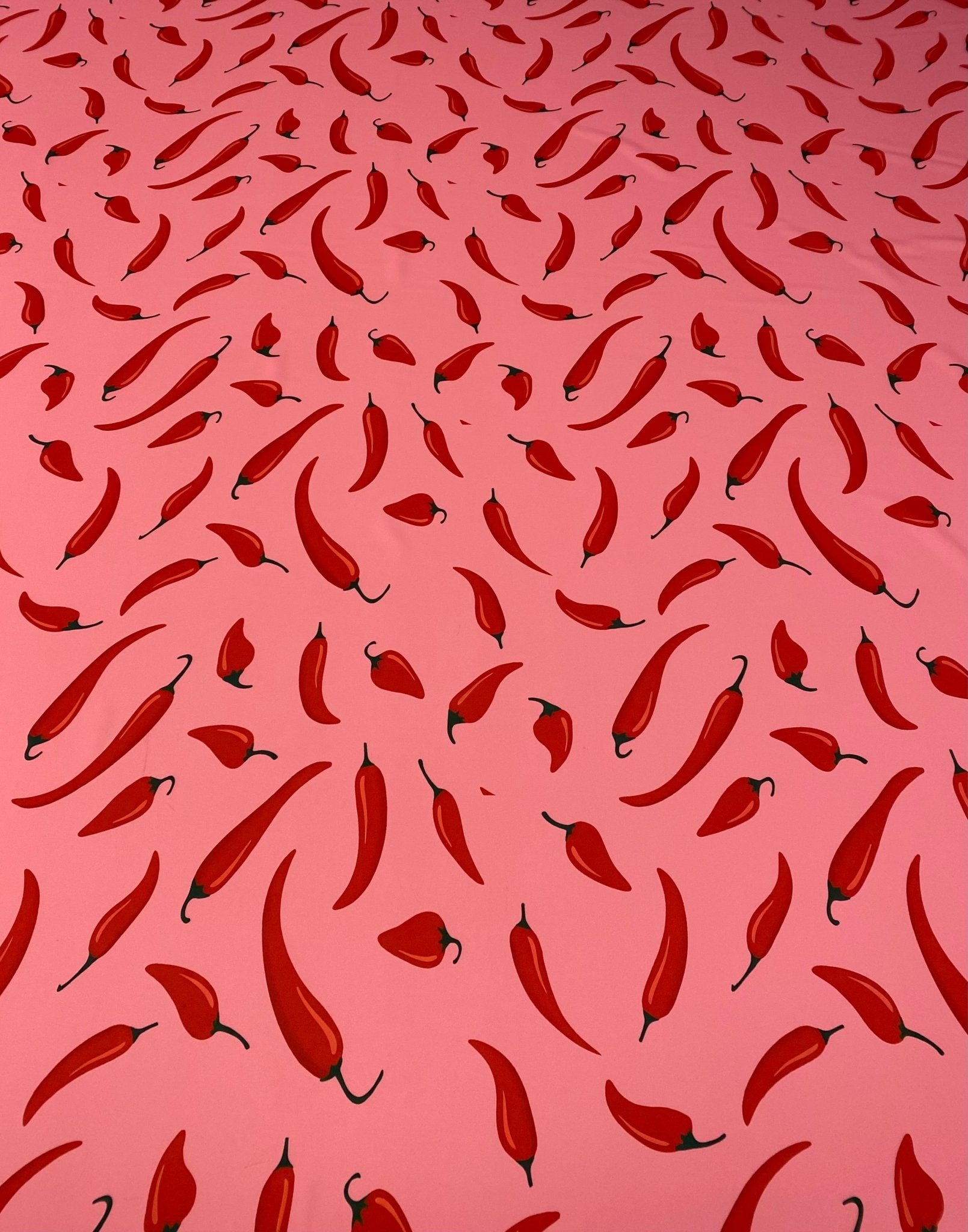 Red Chilli Pepper Print Fabric on Pink by the Metre - Whotex Fabrics London