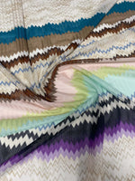 Colorful zigzag mesh fabric with breathable, durable woven texture ideal for crafting and upholstery projects