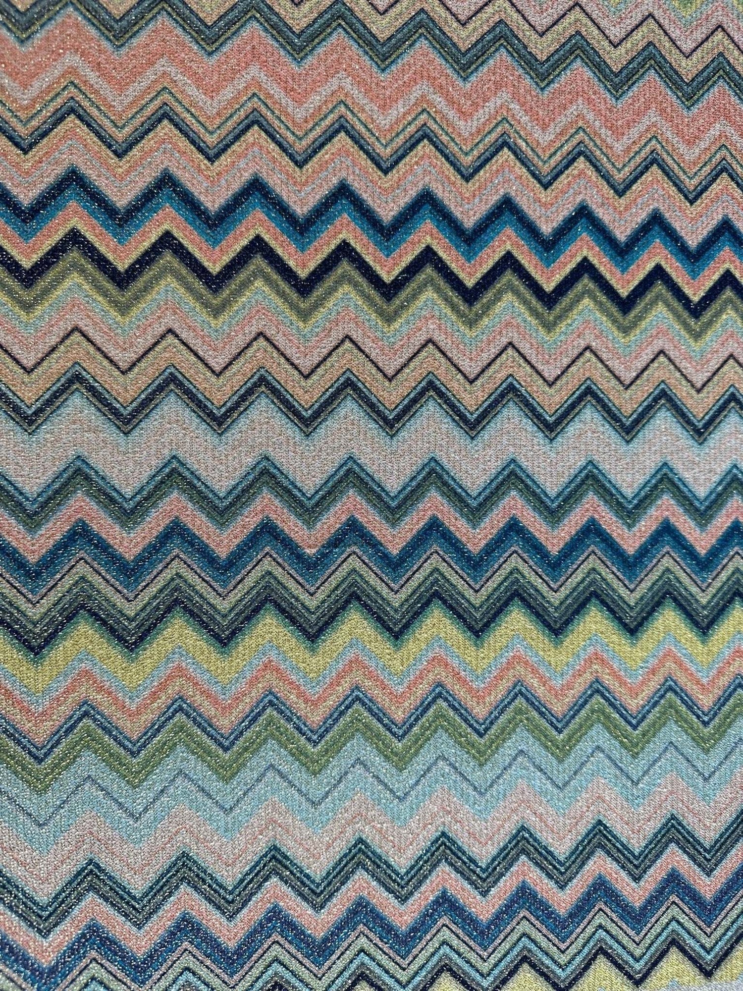 Colorful zigzag knit fabric with gold Lurex thread and textured polyester blend